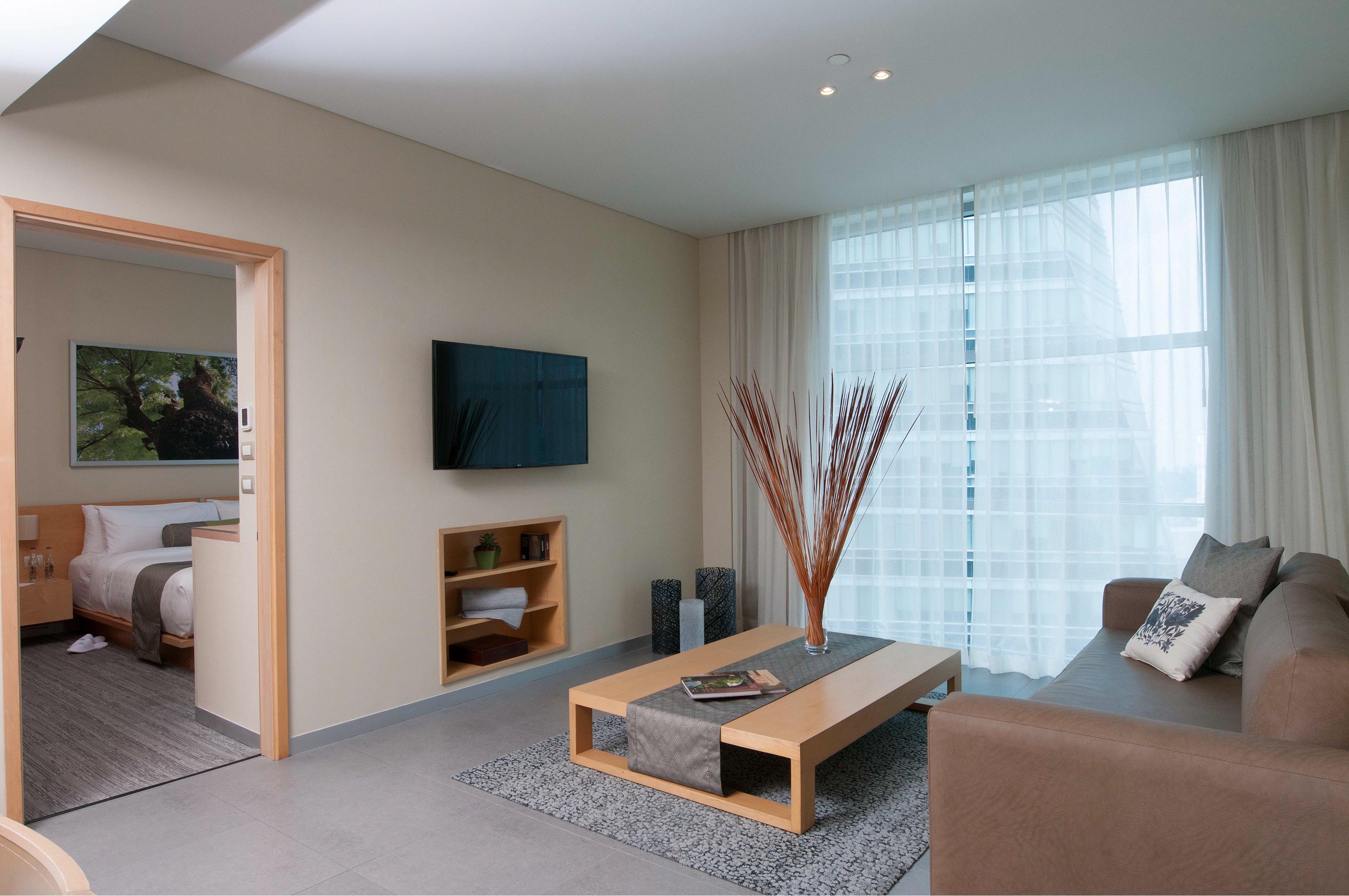 Stadia Suites Mexico City Santa Fe Exterior photo A living room in a hotel suite