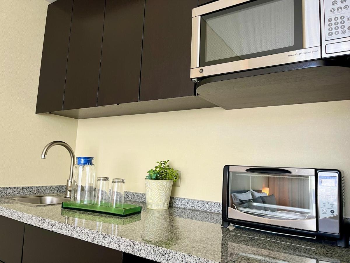 Stadia Suites Mexico City Santa Fe Exterior photo A microwave oven