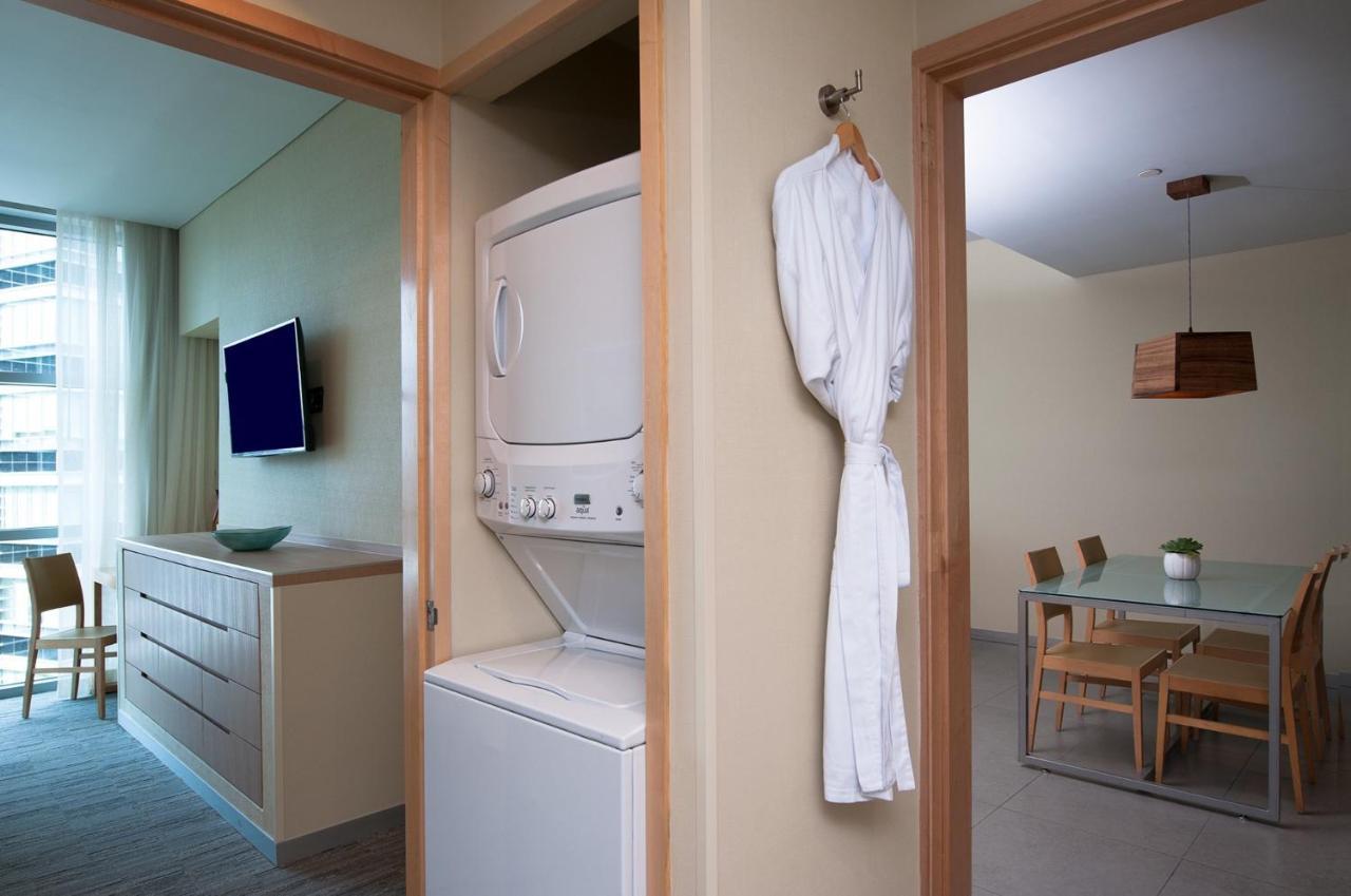 Stadia Suites Mexico City Santa Fe Exterior photo A bathrobe hanging on a wall